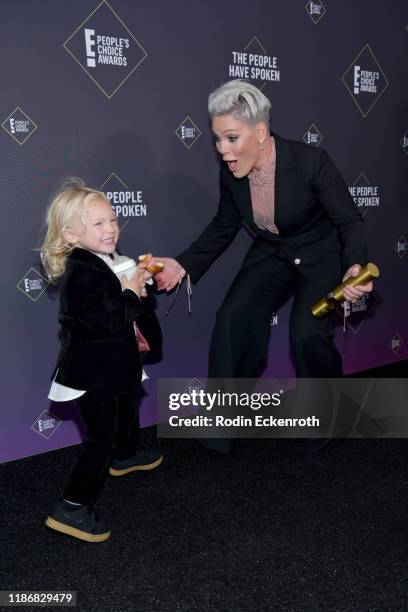 Nk, winner of People's Champion Award and Jameson Moon Hart pose in the press room during the 2019 E! People's Choice Awards at Barker Hangar on...