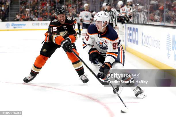 Ryan Nugent-Hopkins of the Edmonton Oilers controls the puck past Ryan Getzlaf of the Anaheim Ducks during the second period of a game at Honda...
