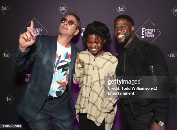 Pictured: Robert Downey Jr., Hendrix Hart and Kevin Hart pose backstage during the 2019 E! People's Choice Awards held at the Barker Hangar on...