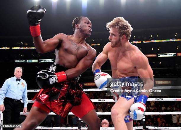 Logan Paul and KSI exchange punches their pro debut cruiserweight fight at Staples Center on November 9, 2019 in Los Angeles, California. KSI won by...