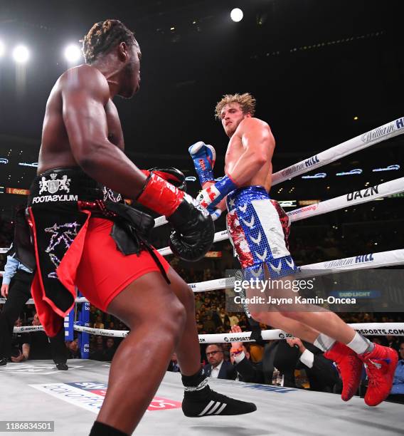 Logan Paul and KSI exchange punches their pro debut cruiserweight fight at Staples Center on November 9, 2019 in Los Angeles, California. KSI won by...