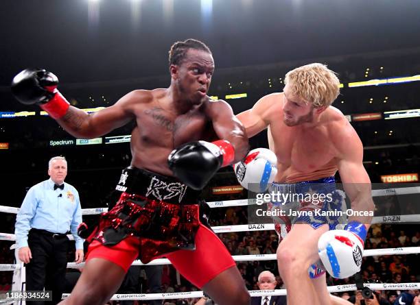 Logan Paul and KSI exchange punches their pro debut cruiserweight fight at Staples Center on November 9, 2019 in Los Angeles, California. KSI won by...