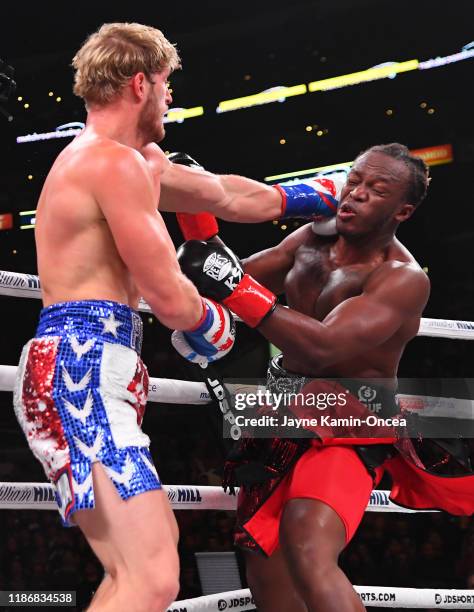 Logan Paul and KSI exchange punches their pro debut cruiserweight fight at Staples Center on November 9, 2019 in Los Angeles, California. KSI won by...