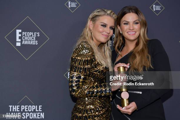 Tanya Rad and Becca Tilley, winners of The Pop Podcast of 2019, pose in the press room during the 2019 E! People's Choice Awards at Barker Hangar on...