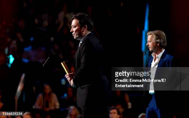 Pictured: Jimmy Fallon accepts The Nighttime Talk Show of 2019 award for 'The Tonight Show Starring Jimmy Fallon' from David Spade on stage during...