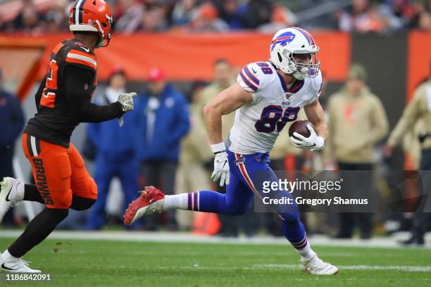 Dawson Knox of the Buffalo Bills runs after a catch against the Cleveland Browns at FirstEnergy Stadium on November 10, 2019 in Cleveland, Ohio....
