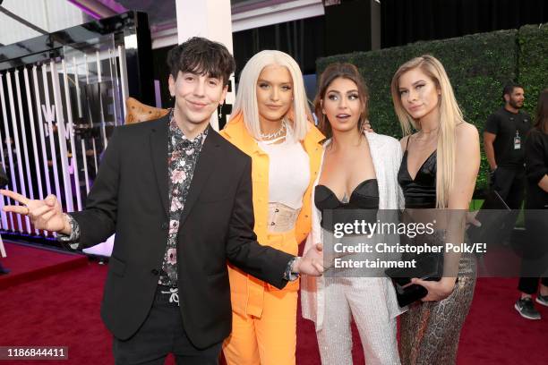 Pictured: Bobby Mares, Alisha Marie, Andrea Russett, and Andie Case arrive to the 2019 E! People's Choice Awards held at the Barker Hangar on...