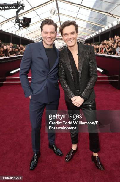 Pictured: Dominic Sherwood and Luke Baines arrive to the 2019 E! People's Choice Awards held at the Barker Hangar on November 10, 2019. -- NUP_188990
