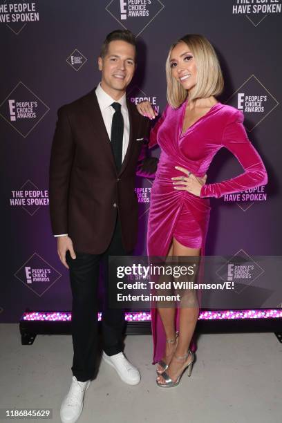 Pictured: Jason Kennedy and Giuliana Rancic pose backstage during the 2019 E! People's Choice Awards held at the Barker Hangar on November 10, 2019...