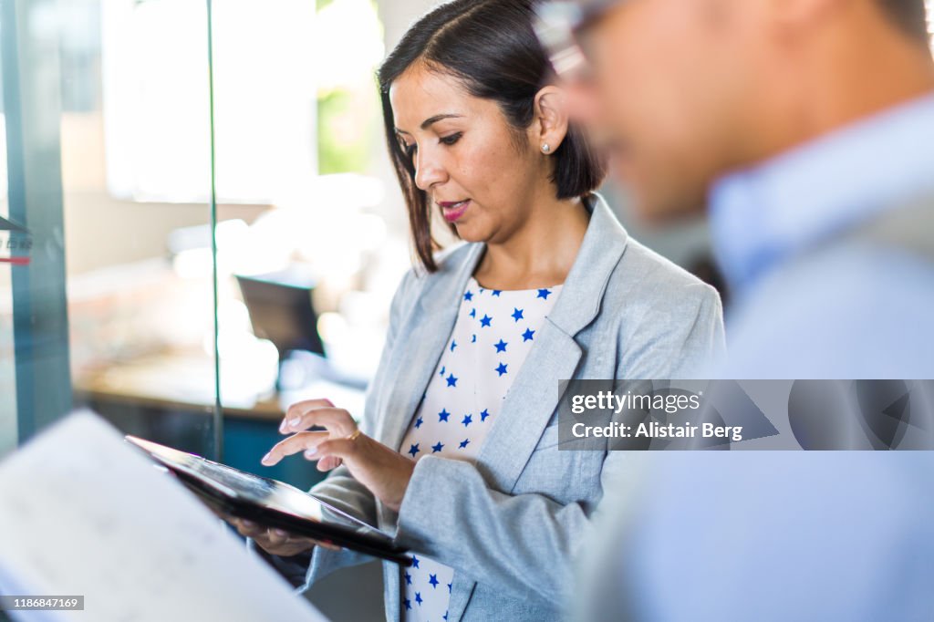 Two managers talking in a small business