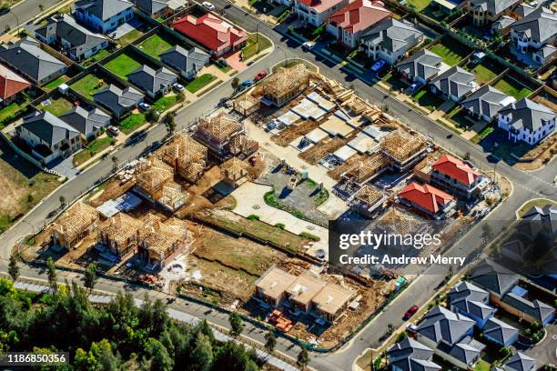 new housing development with streets, building new houses in suburb, urban sprawl in sydney, australia, aerial photography - housing development stock pictures, royalty-free photos & images