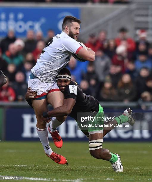 Semi Kunatani of Harlequins and Stuart McCloskey of Ulster during the Heineken Champions Cup Round 3 match between Ulster Rugby and Harlequins at...