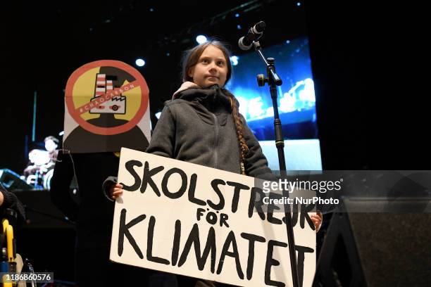 Climate change activist Greta Thunberg speaks onstage during a mass climate march in Madrid for COP25 on December 6th, 2019.