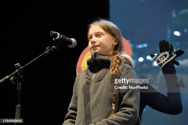 Climate change activist Greta Thunberg speaks onstage during a mass climate march in Madrid for COP25 on December 6th, 2019.