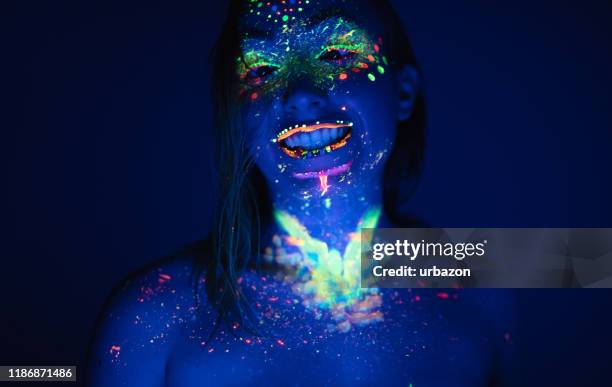 woman with fluorescent makeup - neon fluorescent hair stock pictures, royalty-free photos & images