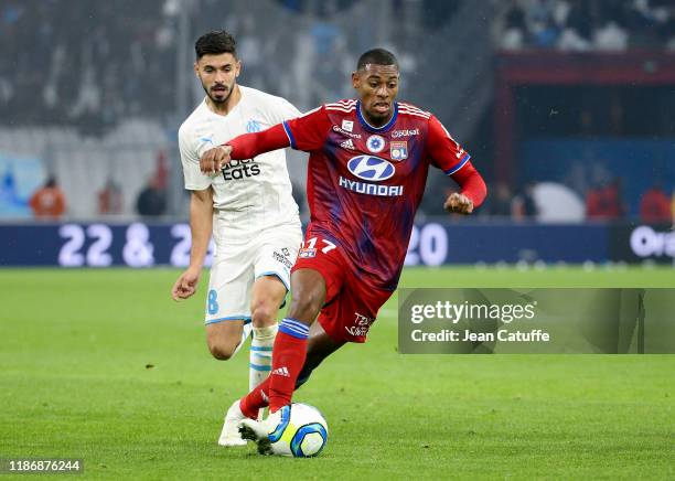 Jeff Reine-Adelaide of Lyon, Morgan Sanson of Marseille during the Ligue 1 match between Olympique de Marseille and Olympique Lyonnais at Stade...