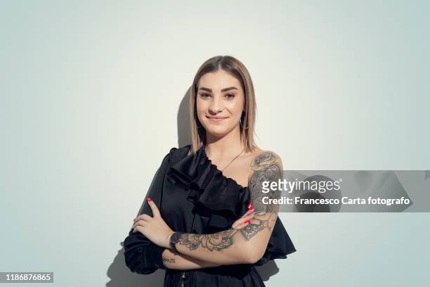 portrait of tattooed young woman - nose piercing stock pictures, royalty-free photos & images