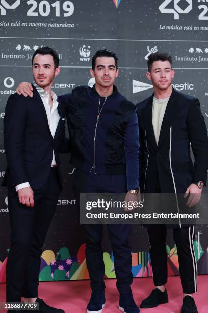 Kevin Jonas, Joe Jonas and Nick Jonas of Jonas Brothers attend 'Los40 music awards 2019' photocall at Wizink Center on November 08, 2019 in Madrid,...