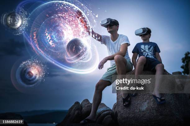 exploring futuristic planetary system in virutal reality - holograma imagens e fotografias de stock