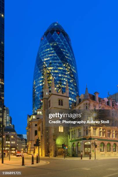 nightfall in the city of london - swiss re tower stock pictures, royalty-free photos & images