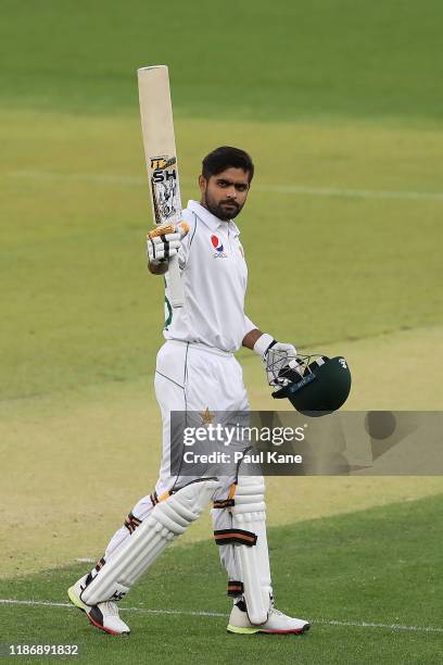 Babar Azam of Pakistan raises his bat after scoring his century during the International Tour match between Australia A and Pakistan at Optus Stadium...