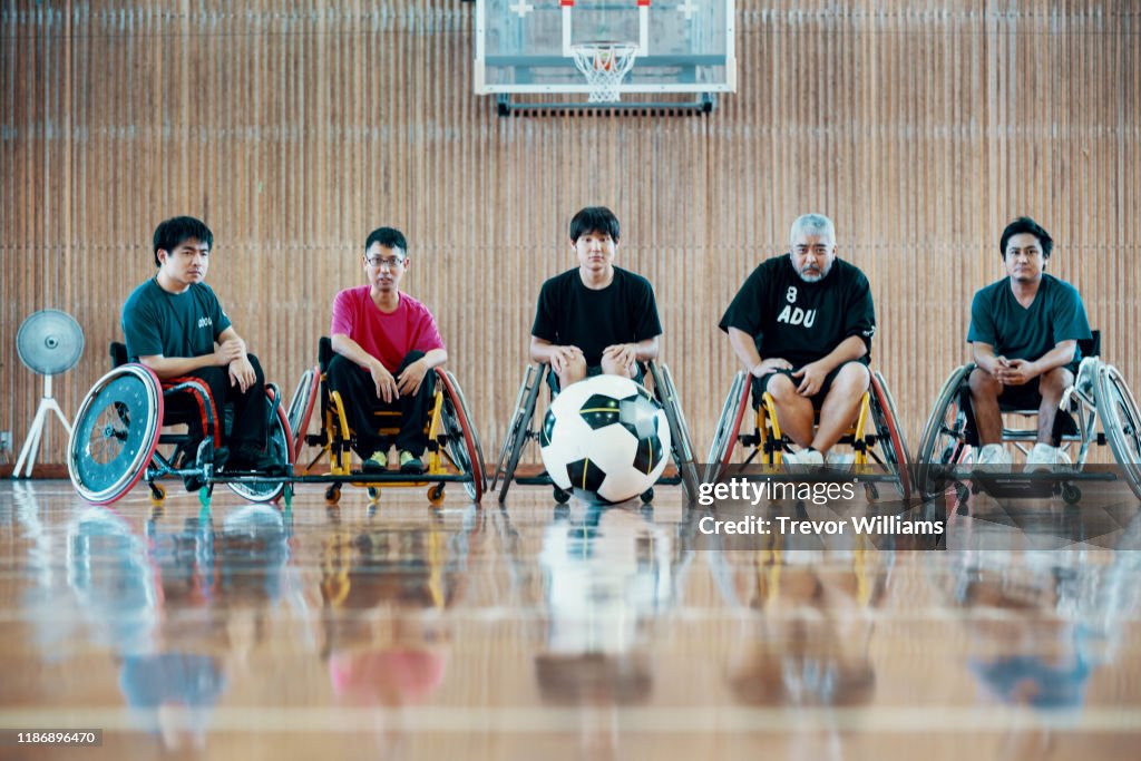 Portrait of a team of wheelchair soccer players