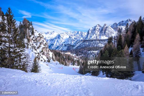 winter landscape in dolomites at cortina d'ampezzo ski resort, italy - adige stock pictures, royalty-free photos & images