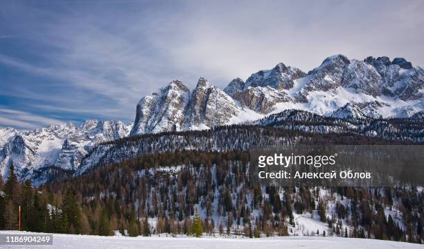 winter landscape in dolomites at cortina d'ampezzo ski resort, italy - cortina stock pictures, royalty-free photos & images