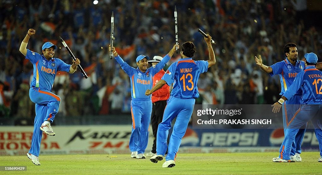 Indian cricketers celebrate victory over