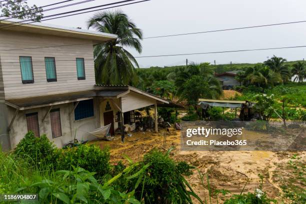 natural disaster landslide engulfs floods residential homes - mudslide stock pictures, royalty-free photos & images