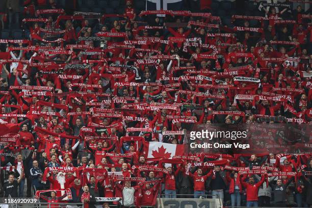 Fans of Toronto FC cheers for his team during the match between Toronto FC and Seattle Sounders as part of the MLS Cup 2019 at CenturyLink Field on...