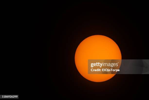 transit of the planet mercury across the sun (bottom right), 11th november 2019, montevideo, uruguay - mercury planet foto e immagini stock