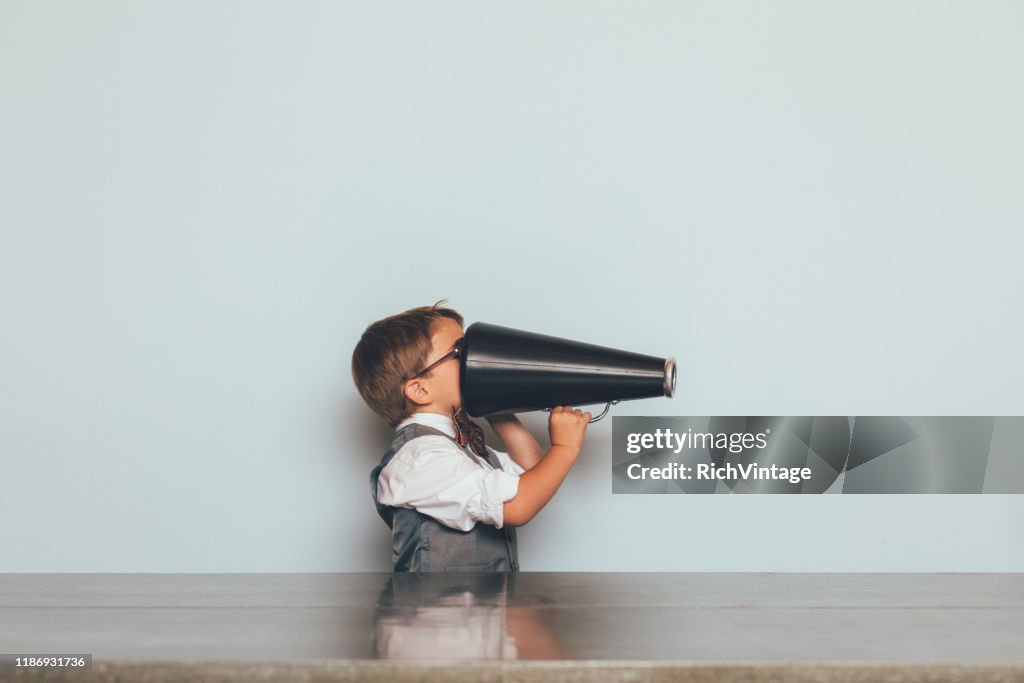 Young Nerd Boy with Megaphone