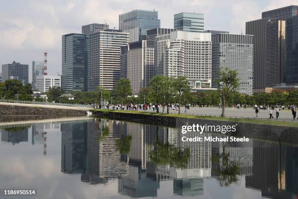 General view showing downtown Tokyo Station office buildings from the Imperial Palace moat on November 01, 2019 in Tokyo, Japan.