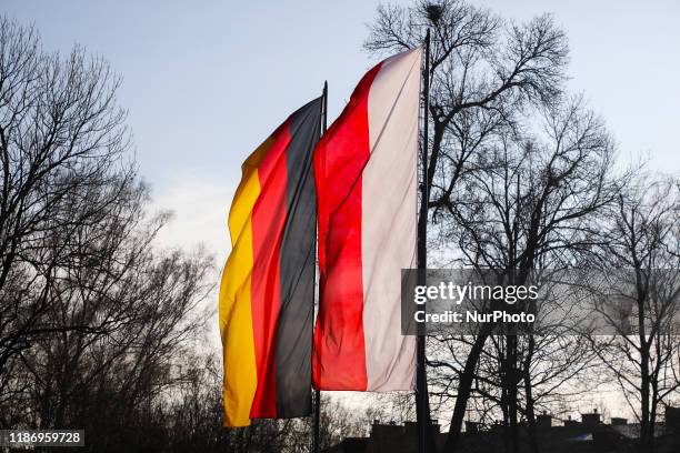 German and Polish flags are seen at Auschwitz I former Nazi concentration camp during Chancellor Angela Merkel visit in Oswiecim, Poland on 6...