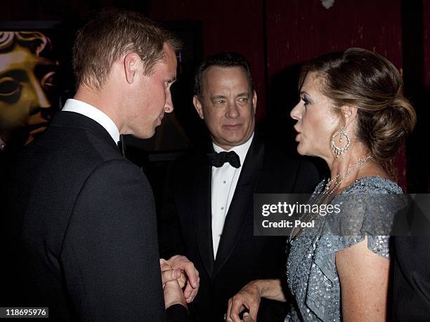 Prince William, Duke of Cambridge speaks to Tom Hanks and his wife Rita Wilson at the 2011 BAFTA Brits To Watch Event at the Belasco Theatre on July...