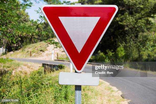 Yield Sign Shape Photos and Premium High Res Pictures - Getty Images