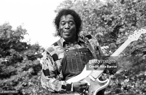 American Blues musician Buddy Guy plays guitar as he performs onstage at Central Park's SummerStage, New York, New York, June 19, 1993.