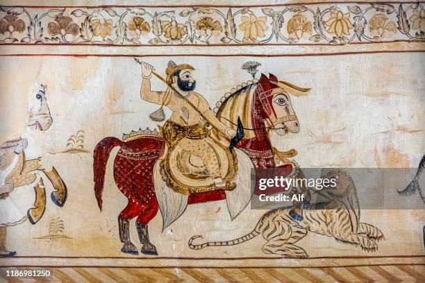 wall painting mural of soldier on horse at lakshminarayan temple in orchha, tikamgarh, madhya pradesh, india - madhya pradesh fort stock pictures, royalty-free photos & images