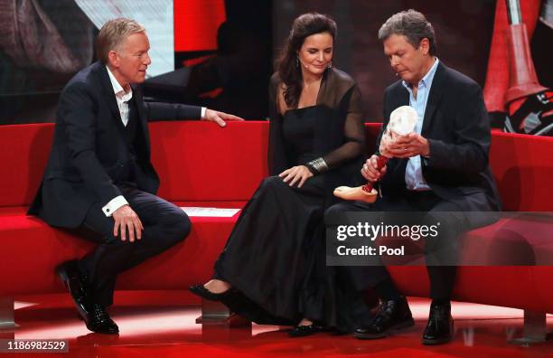 Johannes B. Kerner talks to Elisabeth Lanz and Heinz Trebbin during the Ein Herz Fuer Kinder Gala show at Studio Berlin Adlershof on December 7, 2019...