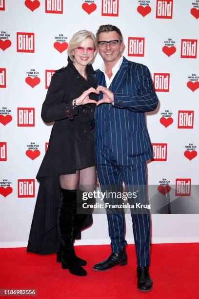 Hans Sigl and his wife Susanne Sigl during the Ein Herz Fuer Kinder Gala at Studio Berlin Adlershof on December 7, 2019 in Berlin, Germany.