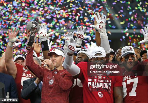 Head coach Lincoln Riley of the Oklahoma Sooners celebrates with his team after defeating the Baylor Bears 30-23 in the Big 12 Football Championship...