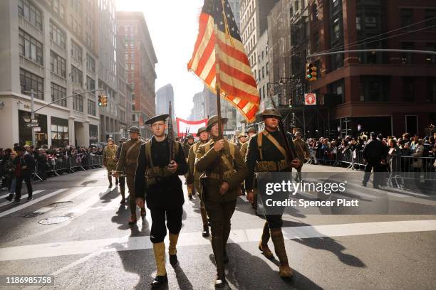 World War I American infantry reenactors march in the Veterans Day Parade on November 11, 2019 in New York City. President Donald Trump, the first...