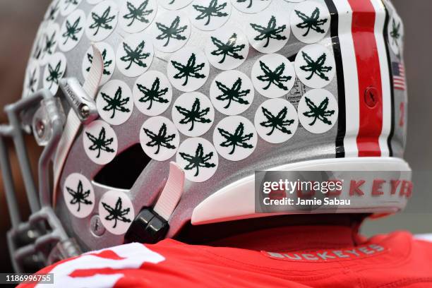 General view of an Ohio State Buckeyes football helmet with buckeye leaf stickers before a game against the Maryland Terrapins at Ohio Stadium on...