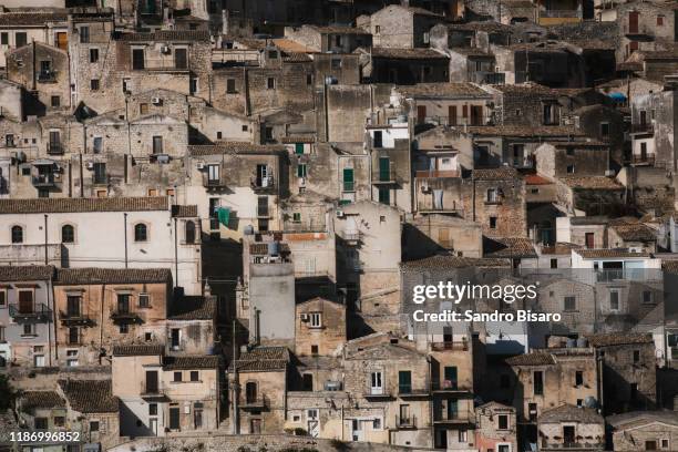modica houses old town in sicily italy - modica sicily stock pictures, royalty-free photos & images