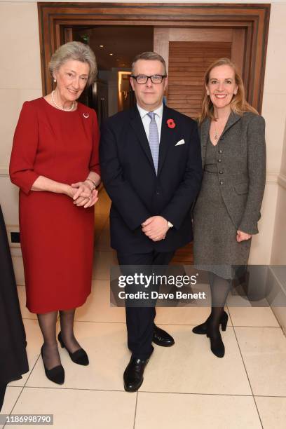 Lady Susan Hussey, David Pogson and Colette Saunders attend the Royal Variety Charity reception at the St James's Hotel on November 11, 2019 in...