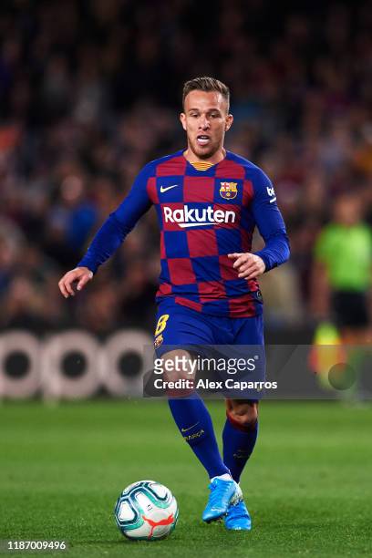 Arthur Melo of FC Barcelona conducts the ball during the La Liga match between FC Barcelona and RC Celta de Vigo at Camp Nou stadium on November 09,...