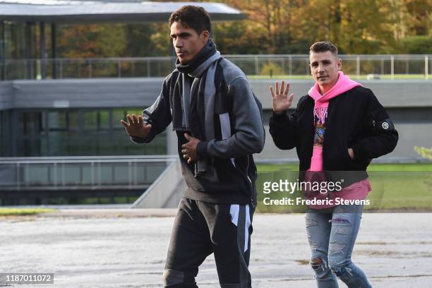 Raphael Varane and Lucas Digne of France arrive ahead of a training session on November 11, 2019 in Clairefontaine, France. France will play against...