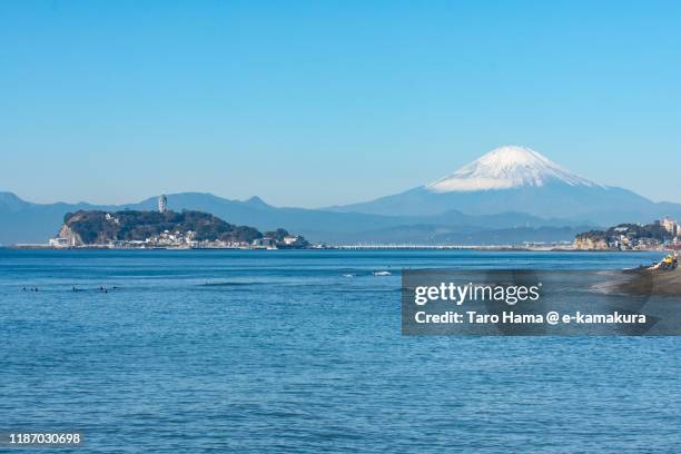 snow-capped mt. fuji and pacific ocean in kanagawa prefecture of japan - enoshima island stock pictures, royalty-free photos & images