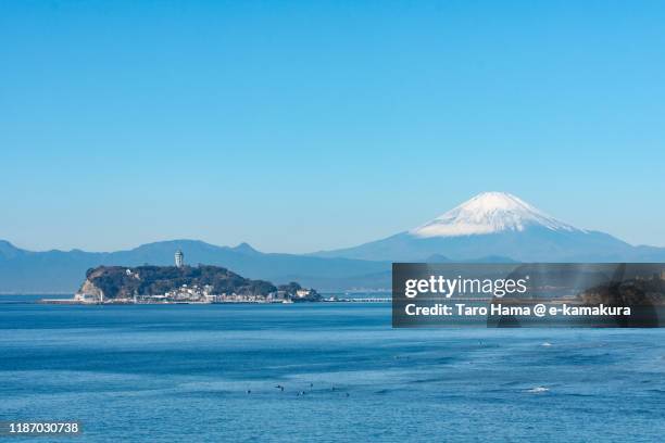 snow-capped mt. fuji and pacific ocean in kanagawa prefecture of japan - enoshima island stock pictures, royalty-free photos & images